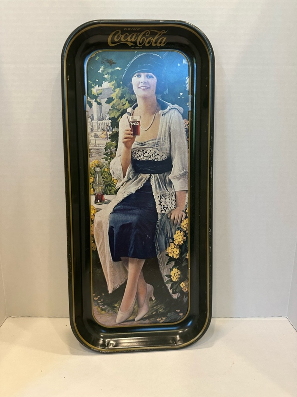 Used vintage 1973 Coca-Cola Black, Navy & Cream Woman Holding Coke Portrait Tray